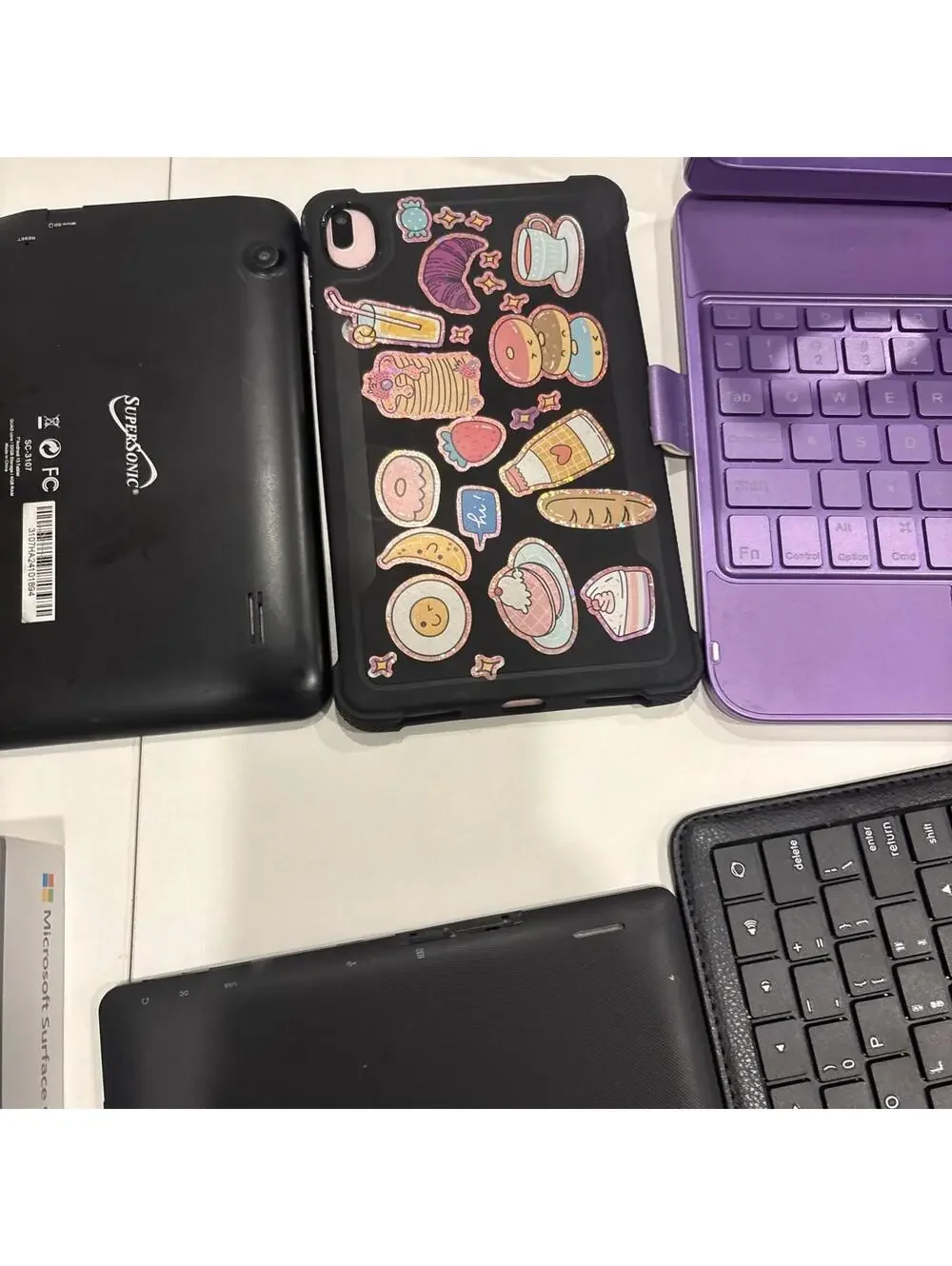 Lot Of 5 Android Tablets, 1 Surface Go, Bluetooth Keyboard & Cases For Part